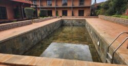 En vente un site hôtelier exceptionnel sur un terrain de 3 000 m² situé à Mandrosoa Ivato