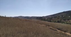 En vente un terrain de 9 000 m² idéalement situé le long de la RN2, à Ambohimalaza